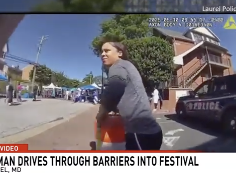 Woman driver tears police tape